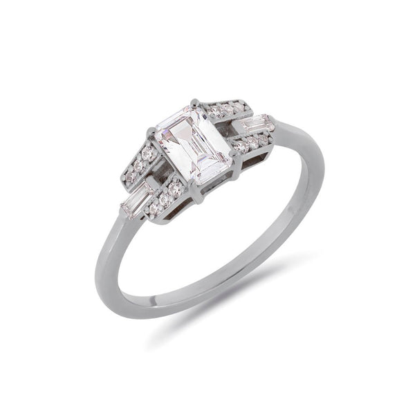 Emerald cut diamond buckle ring in platinum