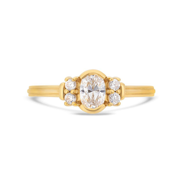 Deco oval cut solitaire diamond ring in yellow gold
