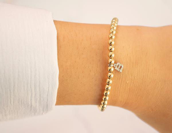 14k Gold Diamond Initial on a Gold-filled Stretch Beaded Bracelet